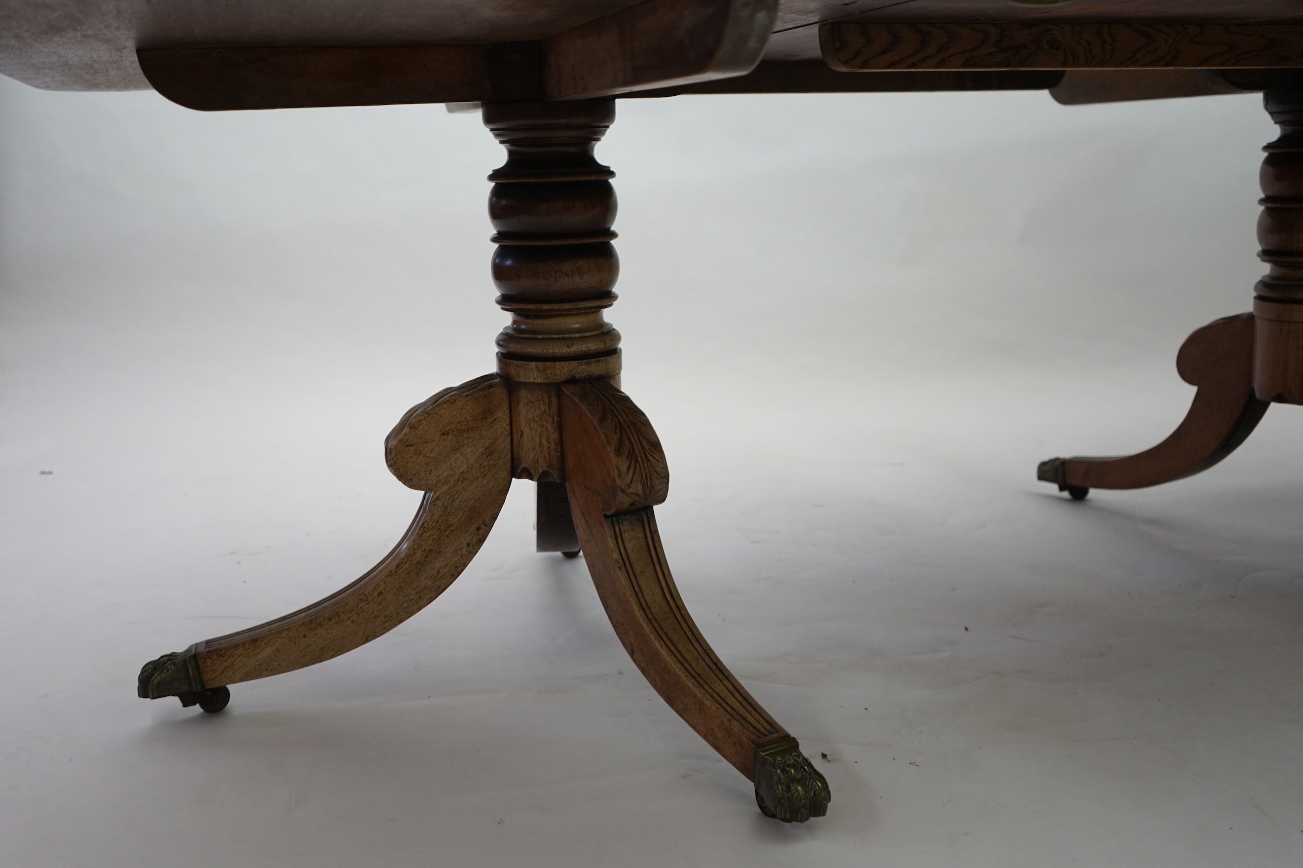 A Regency mahogany extending dining table